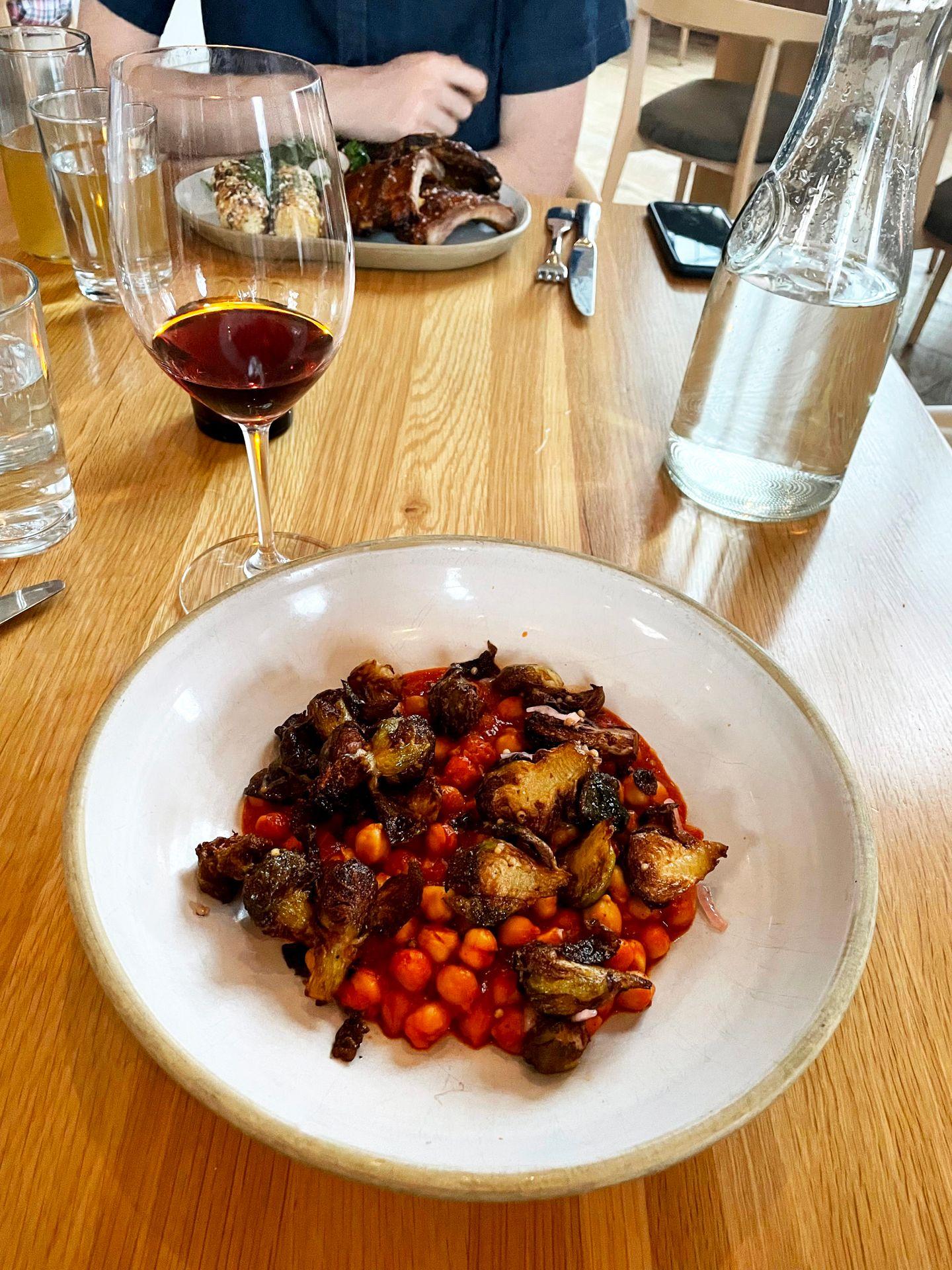 A dish with chickpeas and brussel sprouts at The Preacher's Son