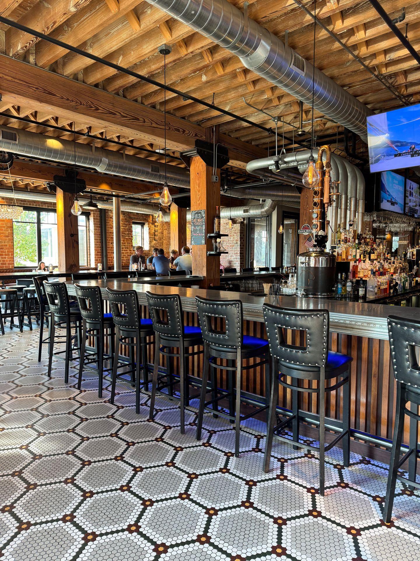 Tile floors and the bar at Black Sheep Social Club