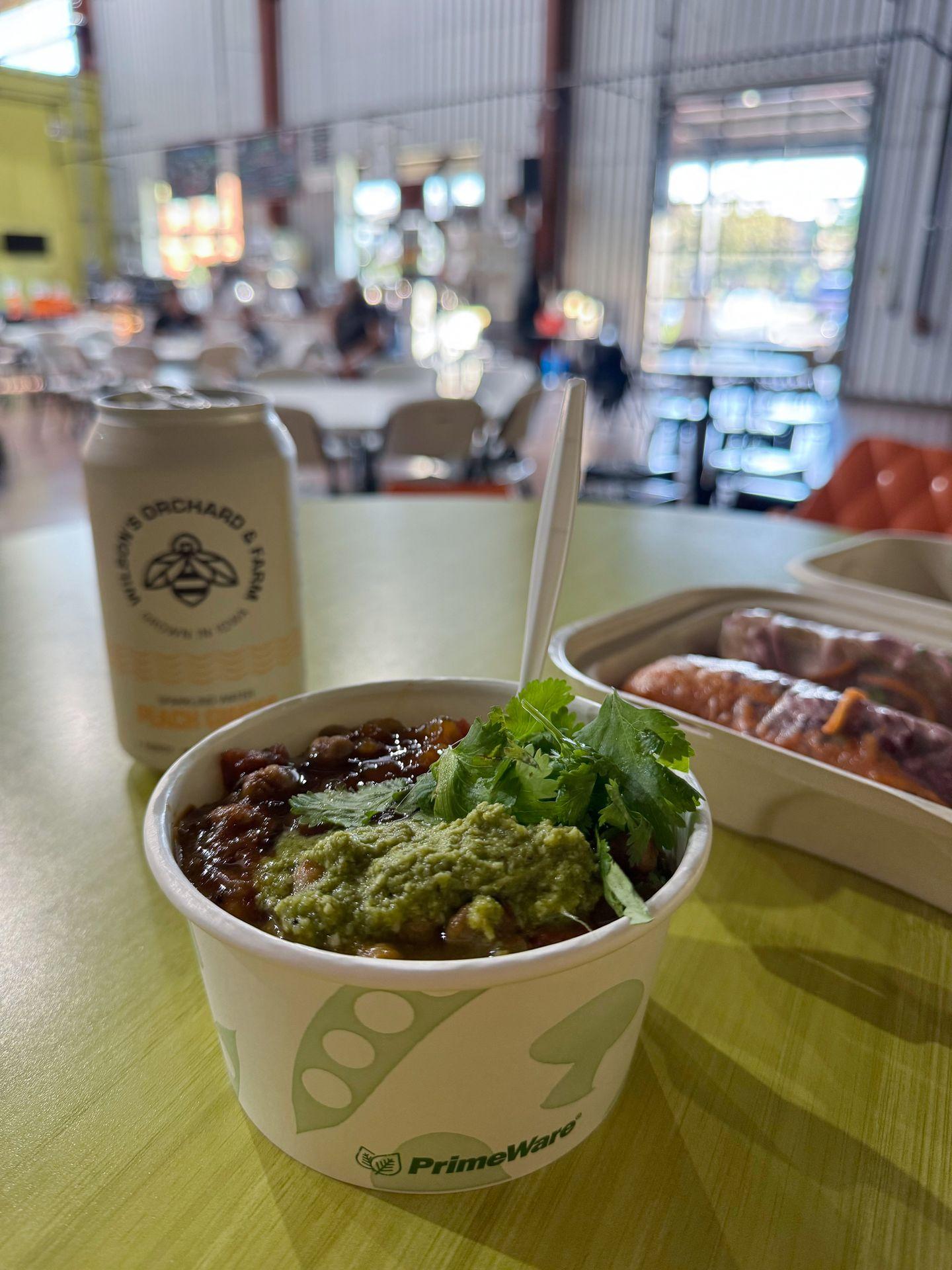 A bowl full of grains and sauces from The Full Bowl