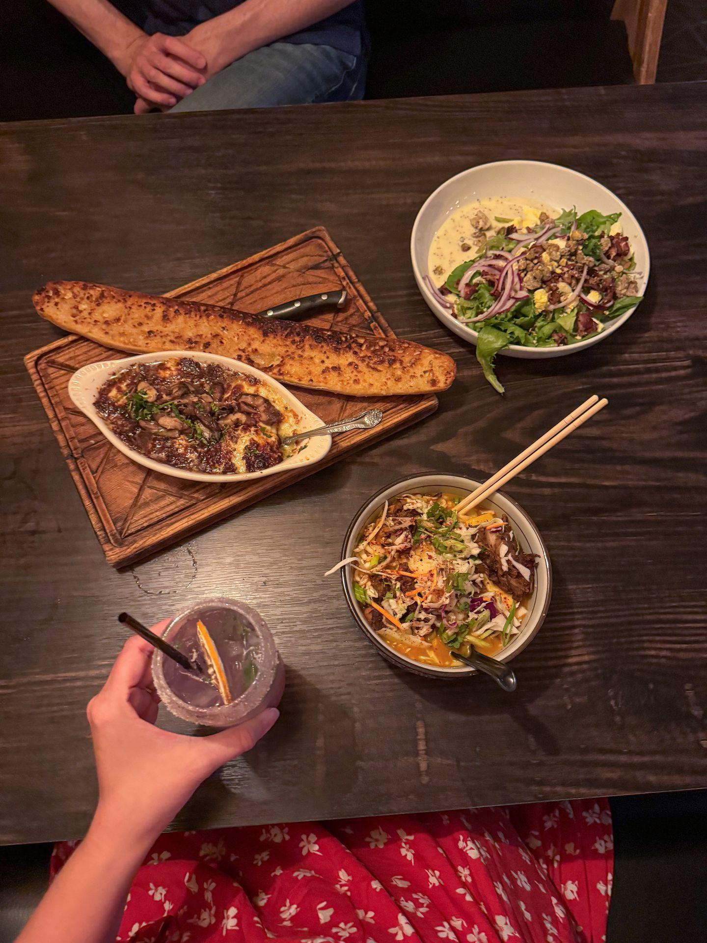 A jackfruit noodle bowl, baked cheese and a salad from the hip-stir