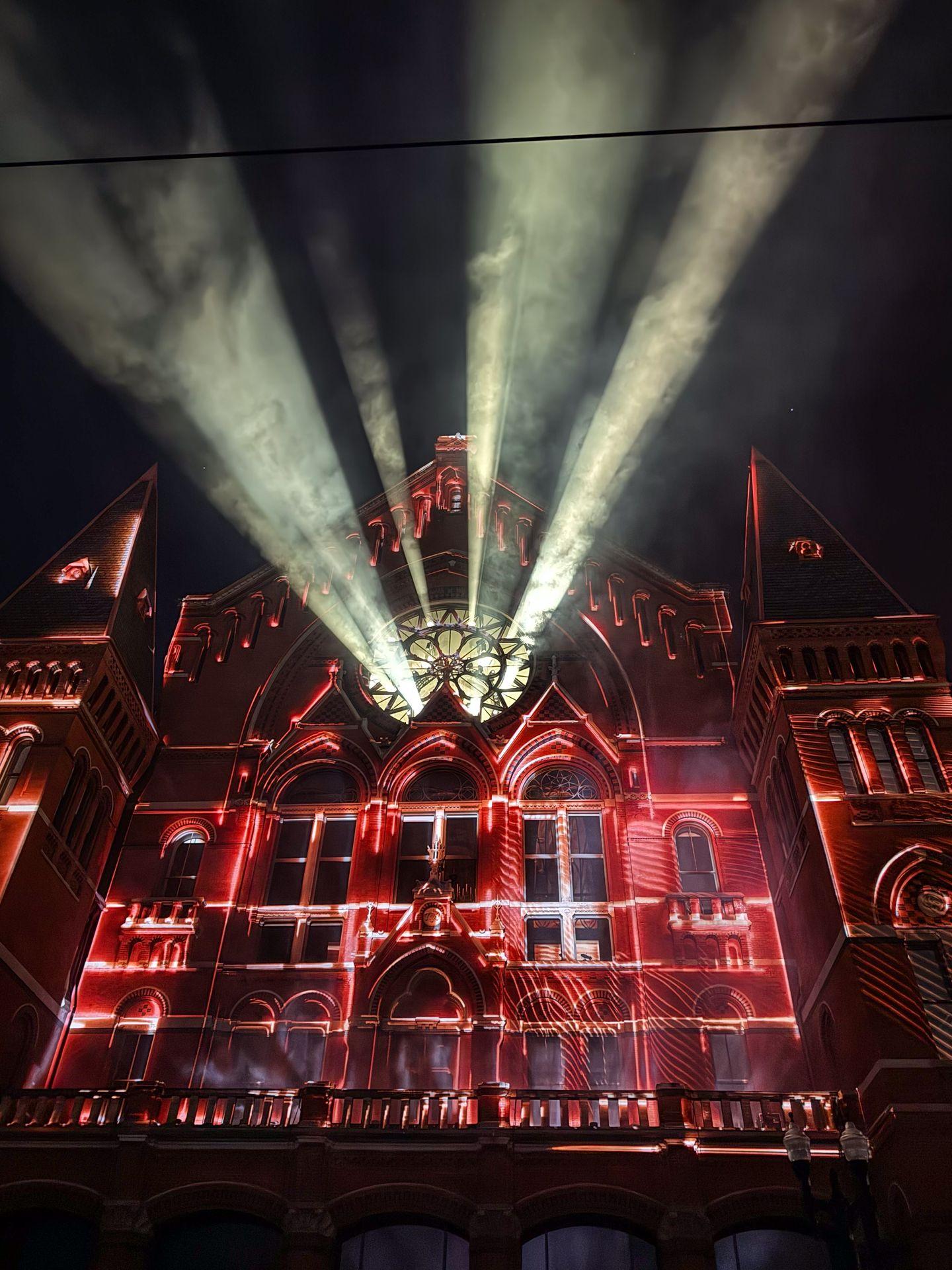 Music Hall lit up in red during the BLINK! festival in 2024