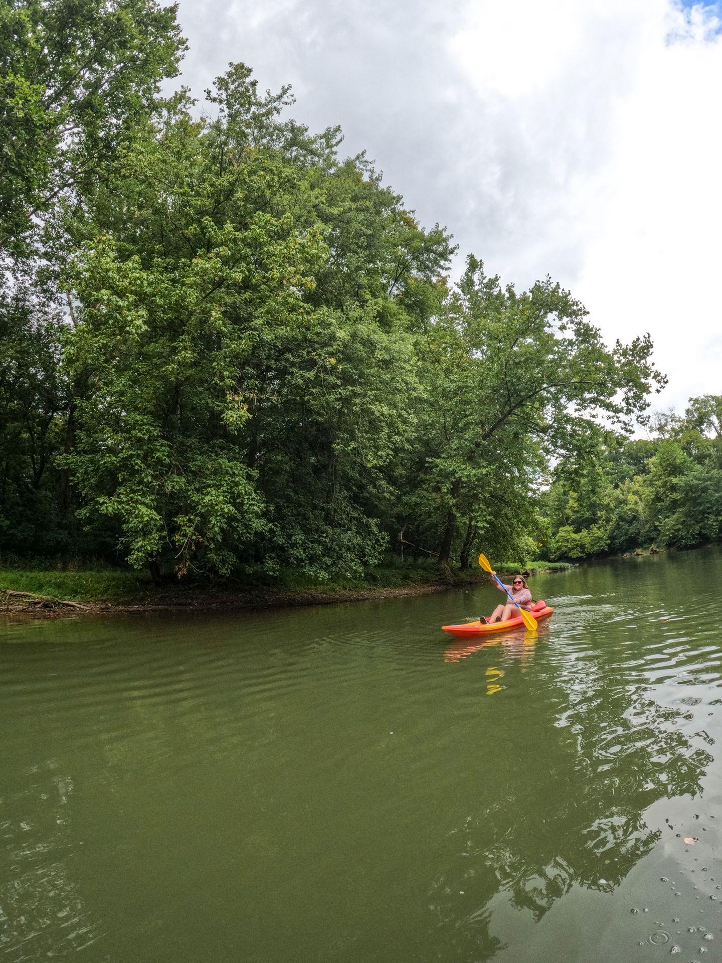 Lydia kayaking on the Little Miami River.