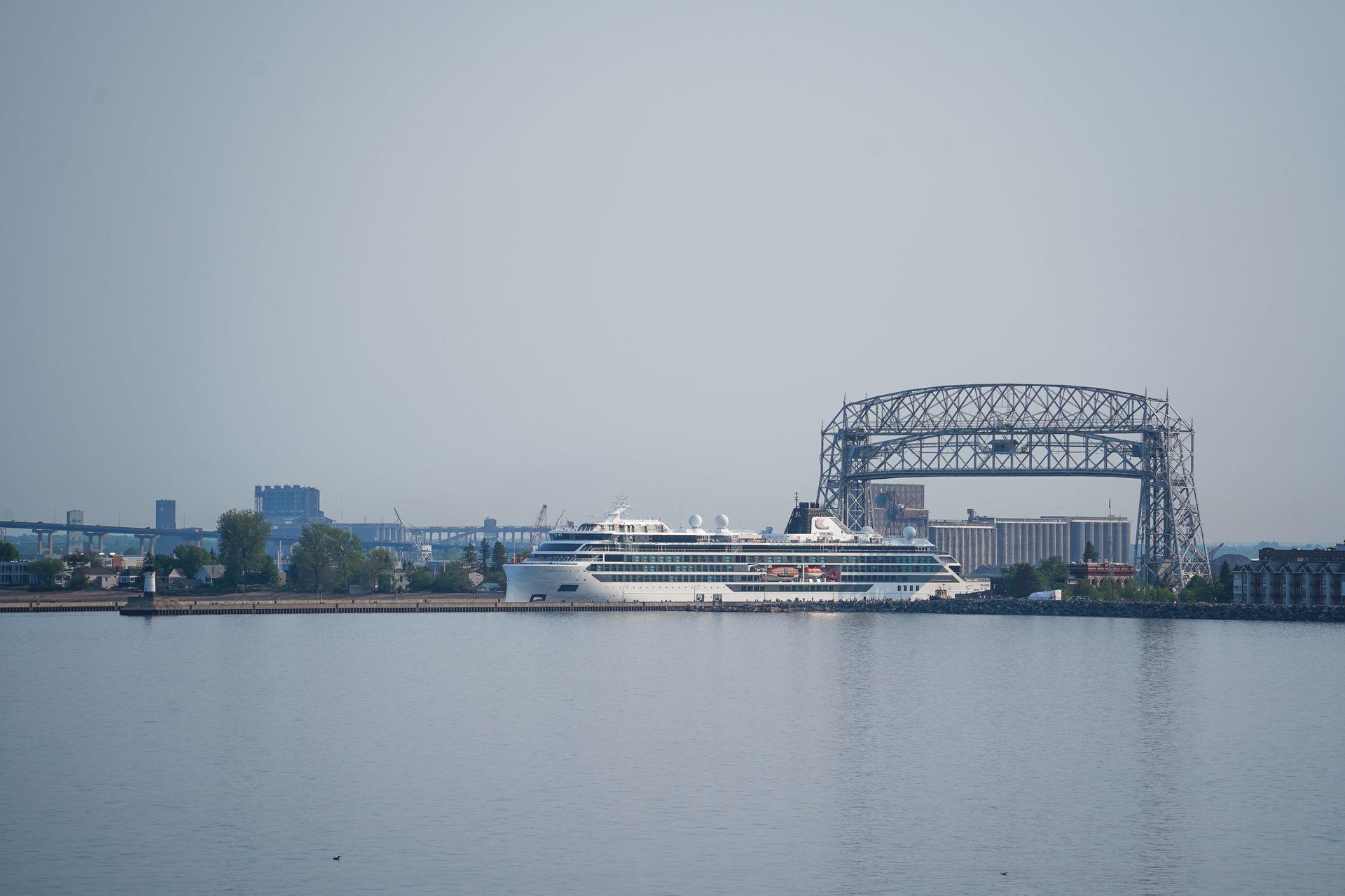 A cruise ship driving under the Aerial Lift Bridge in Duluth