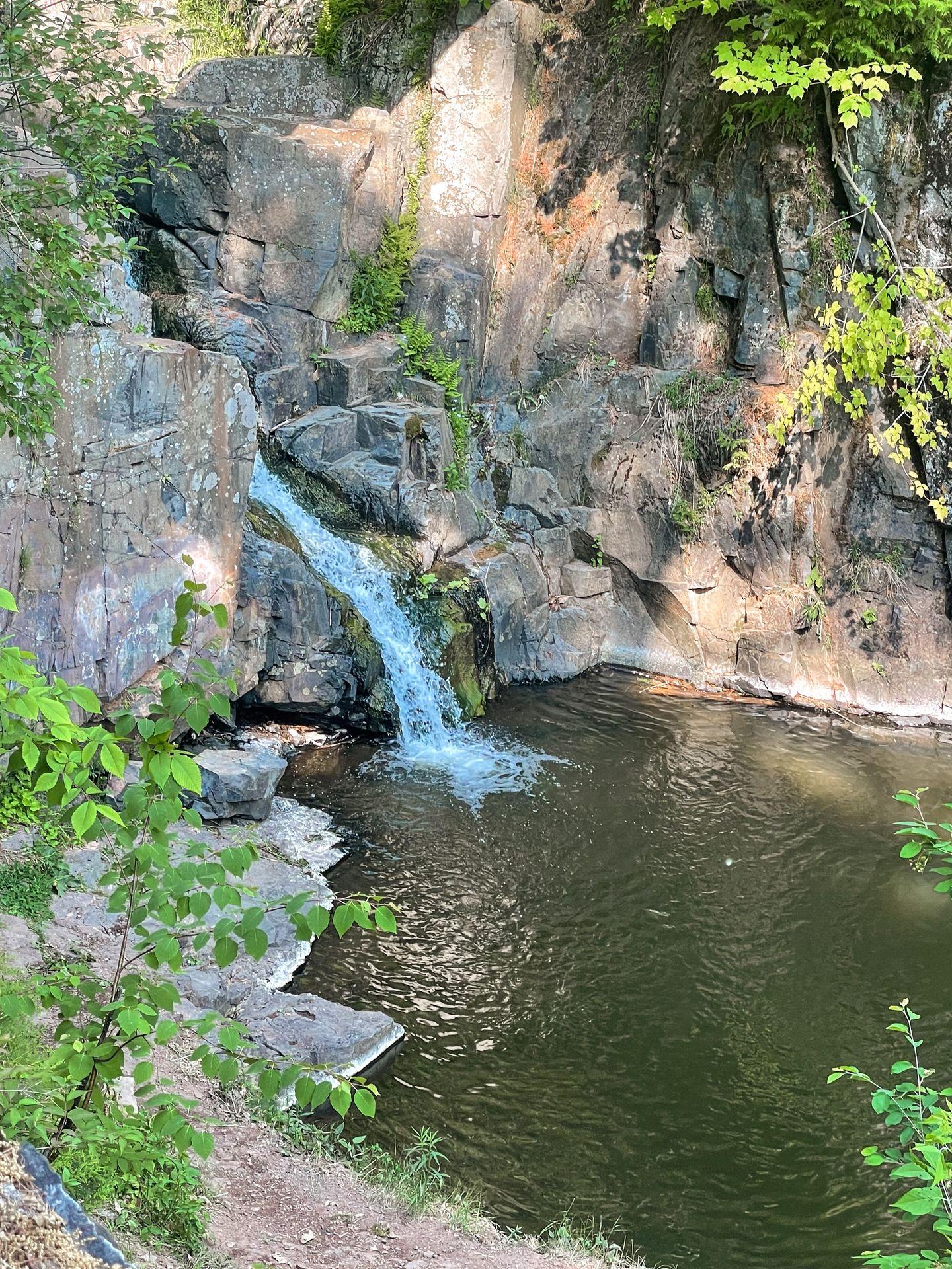 A waterfall cascading down rocks at Chester Park