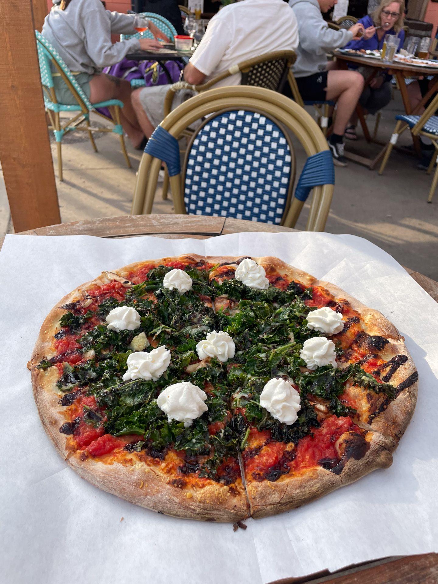 A pizza with kale and ricotta from Ursa Minor