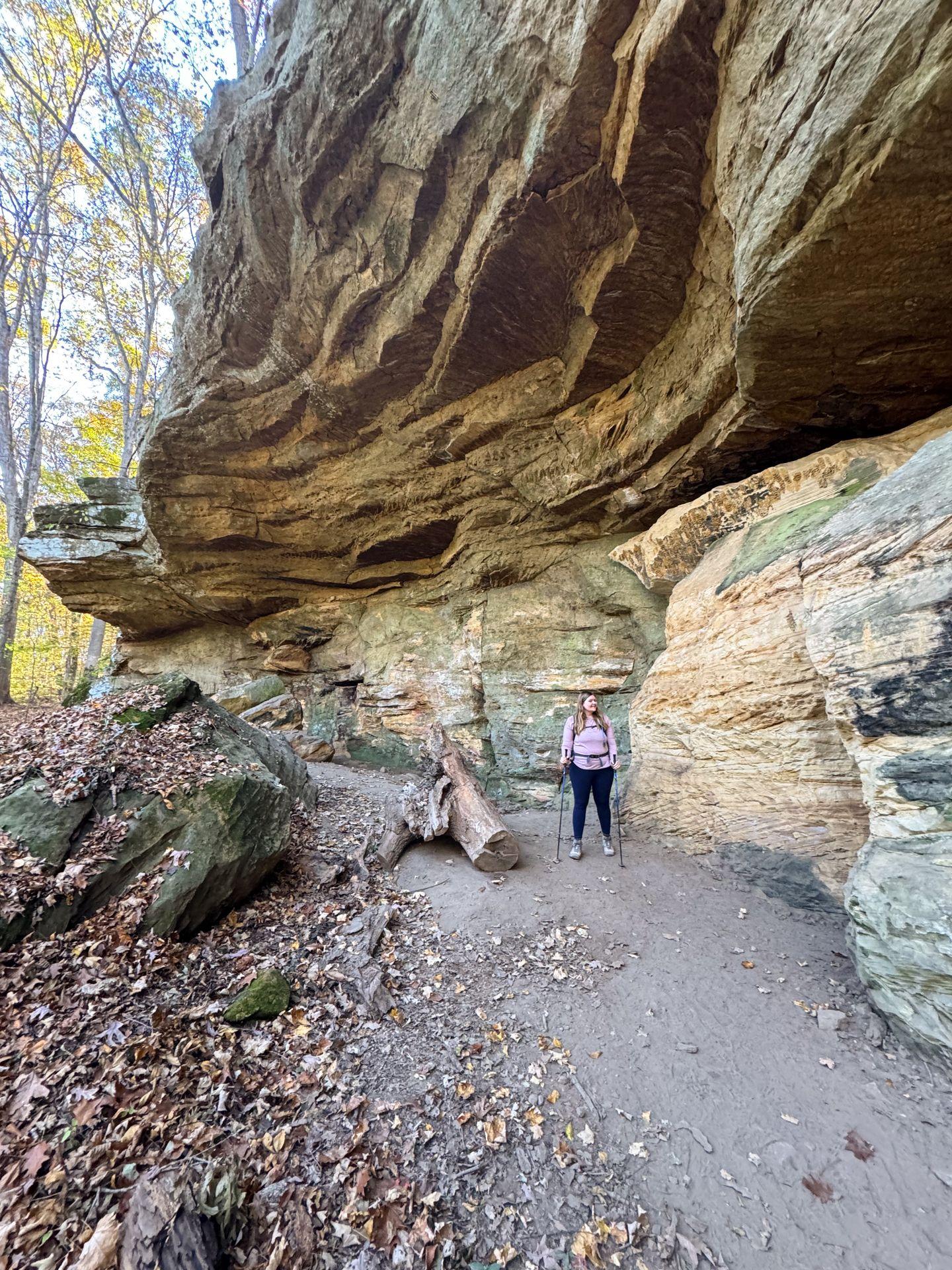 Lydia standing in front of Totem Rock at Patoka Lake