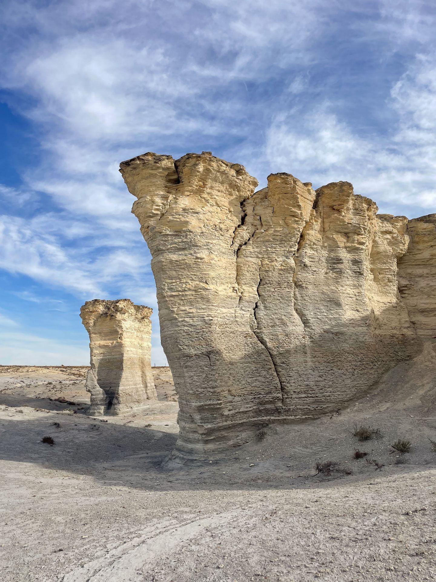 Two towering chalk pillars that are part of the Monument Rocks in Kansas