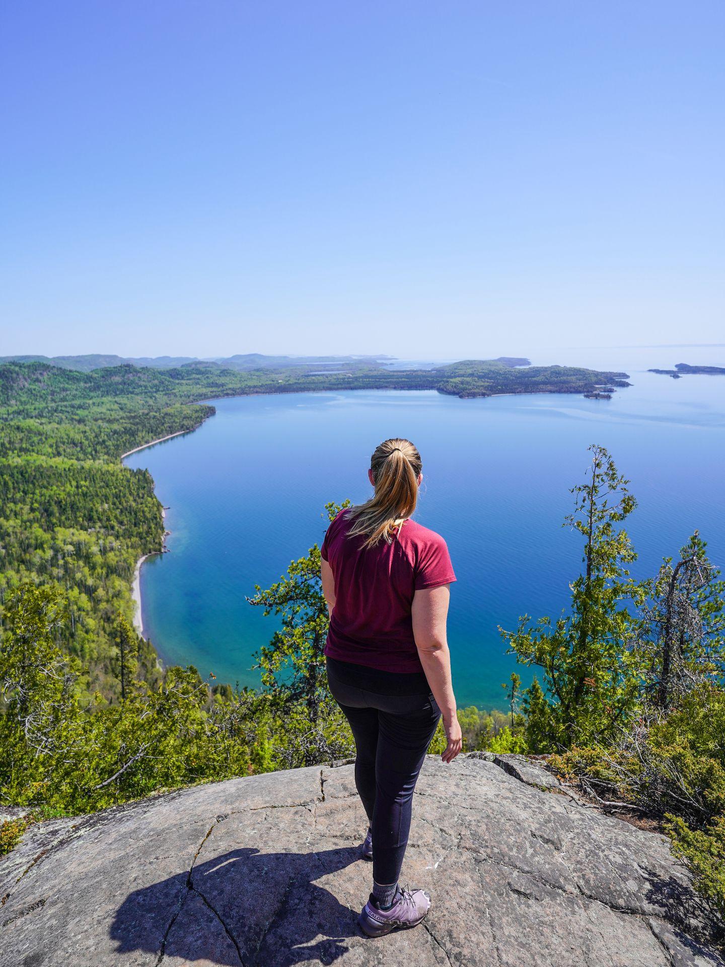 Lydia looking down at Lake Superior from above on the Minnesota North Shore