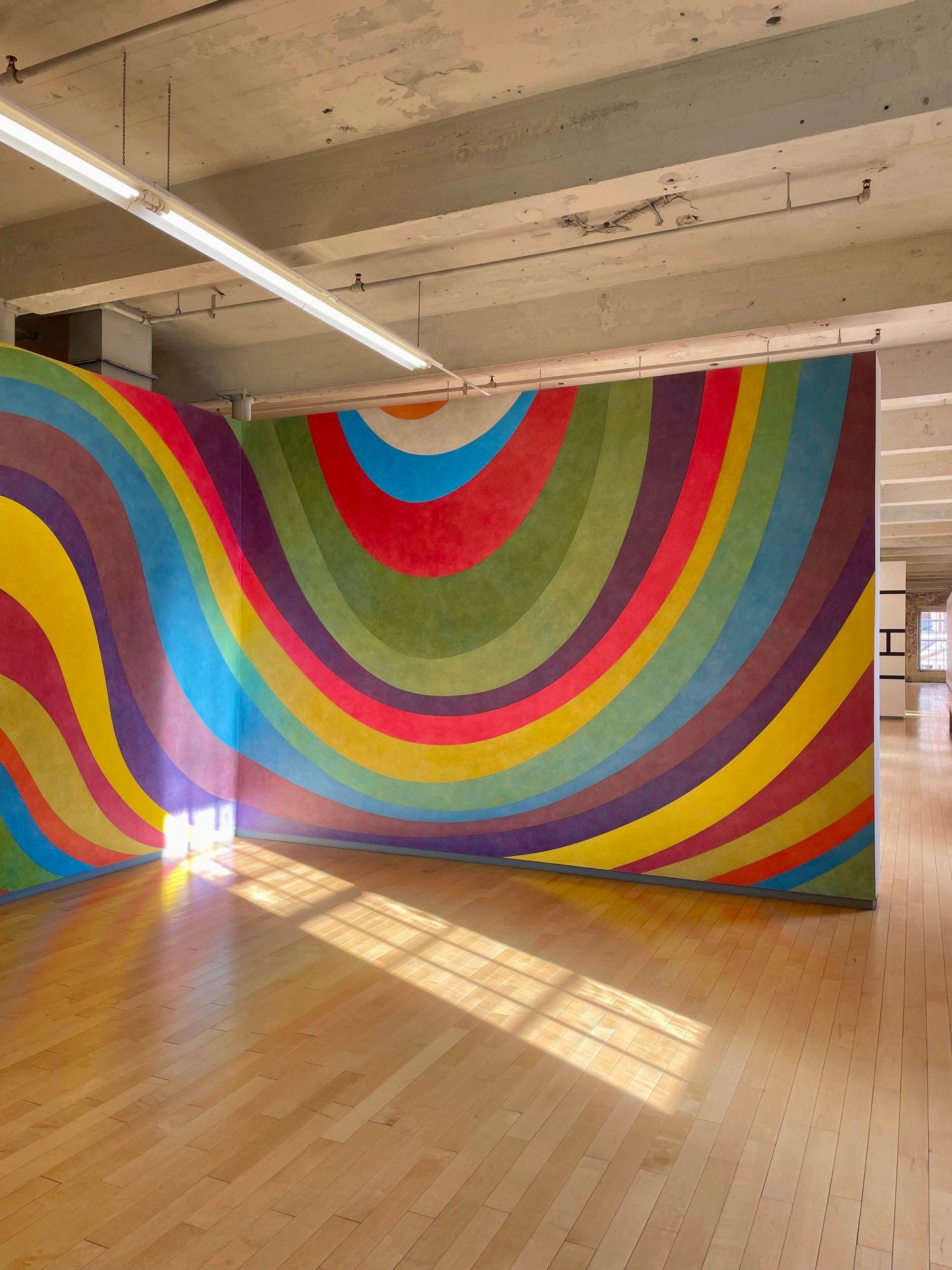 A colorfully painted wall by Sol LeWitt at the MASS MoCA