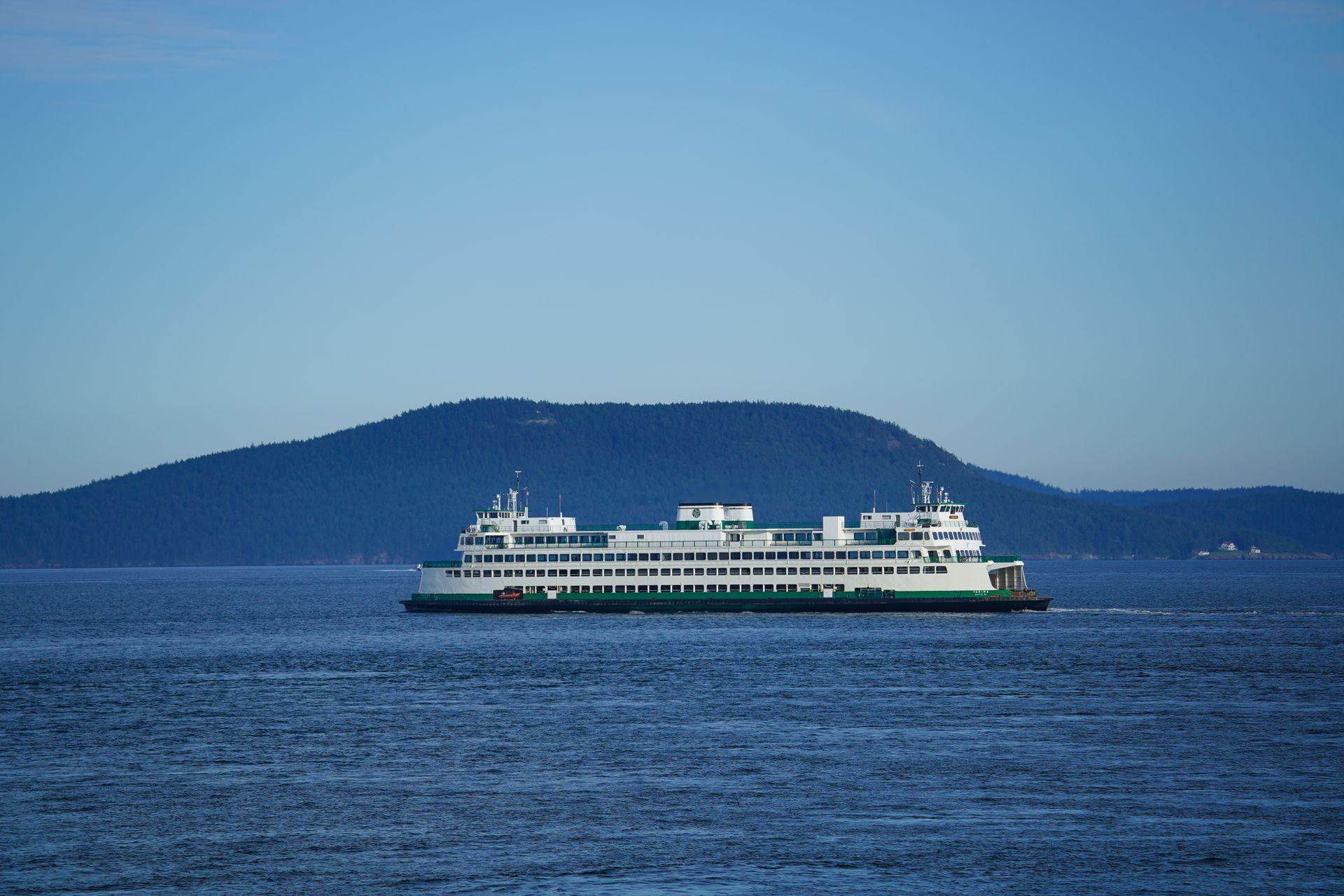 A Washington state ferry seen in the distance while traveling in the San Juan Islands