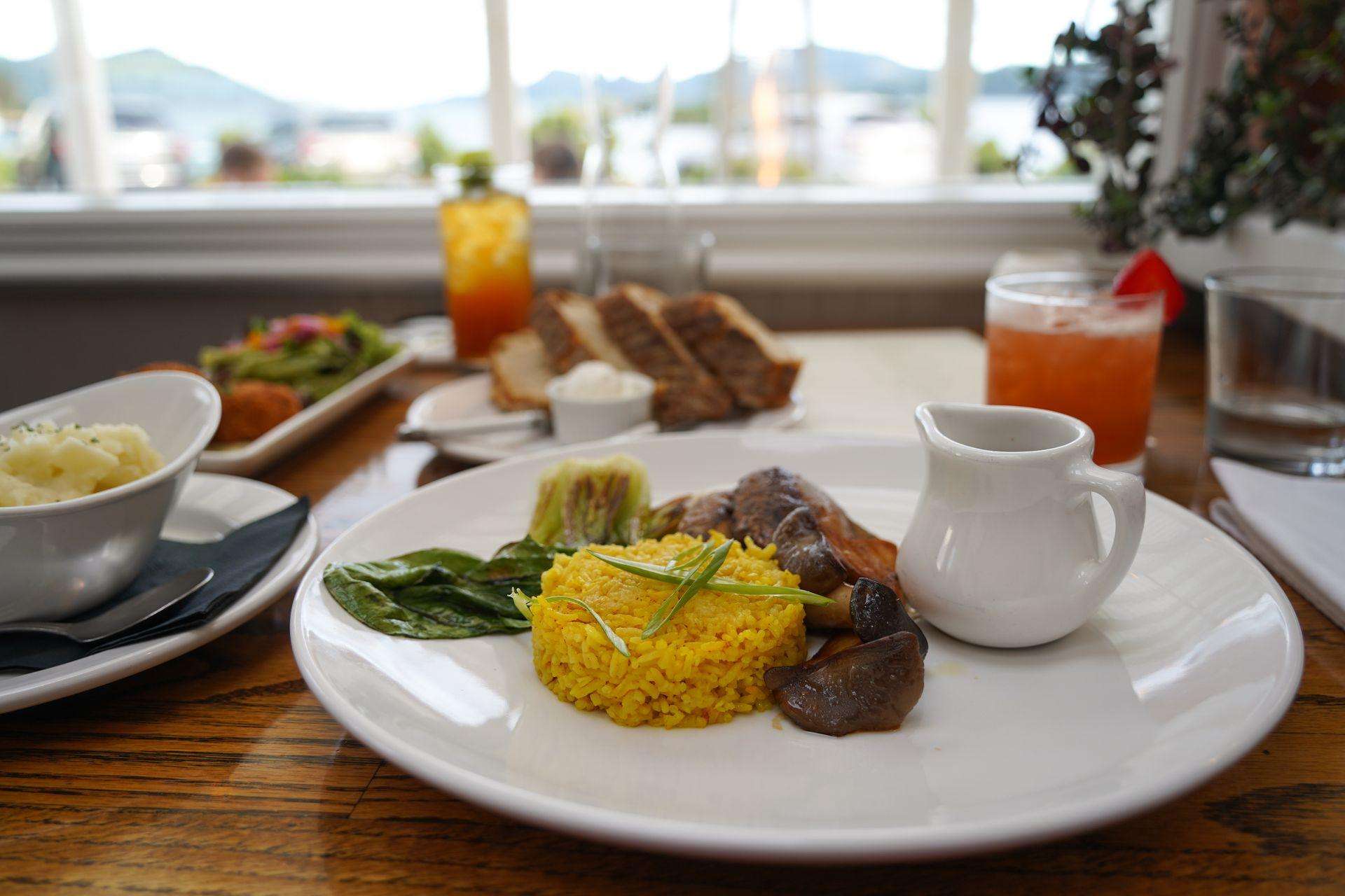 A plate of rice, mushrooms and bok choy at New Leaf Cafe