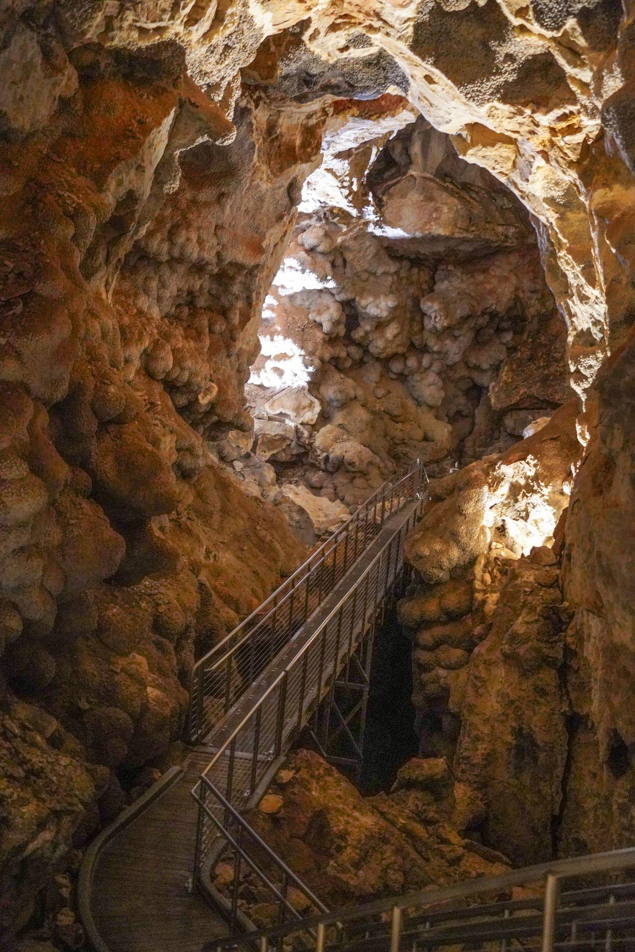 Metal steps heading deeper in the cave at Jewel Cave