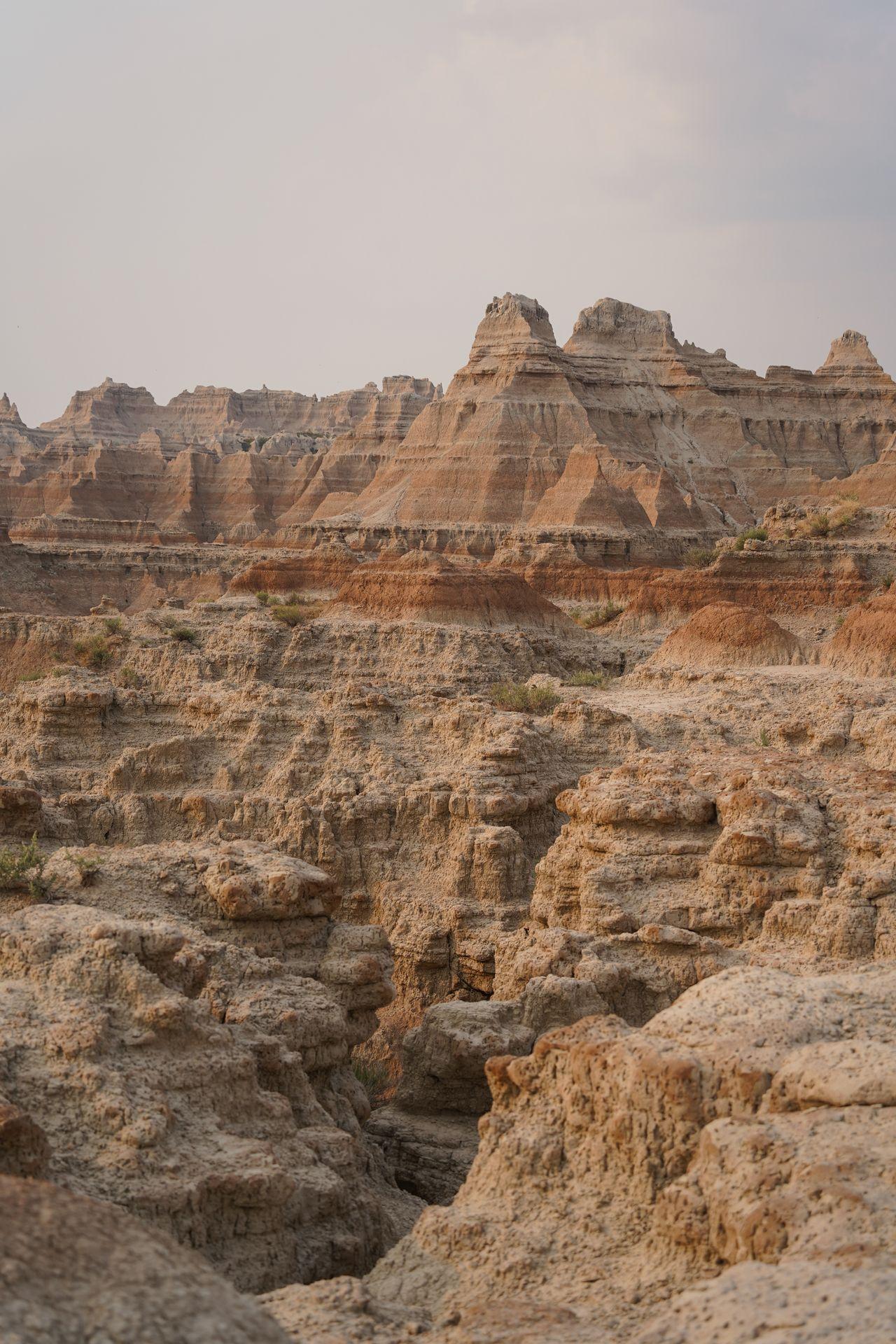 A scene full of tan, jagged rocks on the Door Trail in Badlands National Park