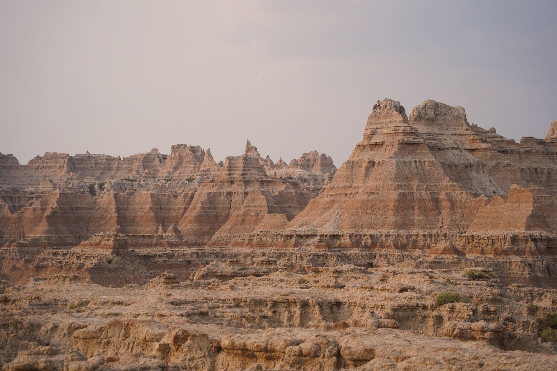 A view of brown, jagged rocks seen from the Door Trail in Badlands National Park