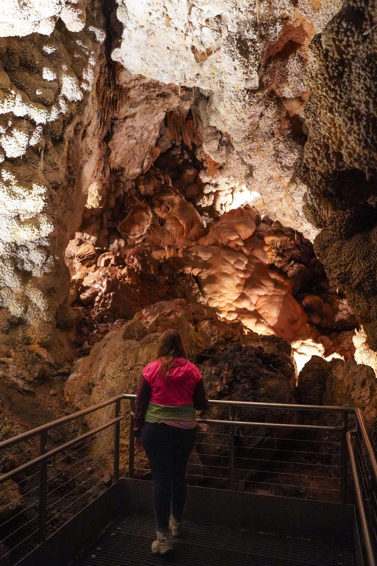 Lydia admiring crystal cave features inside of Jewel Cave National Monument