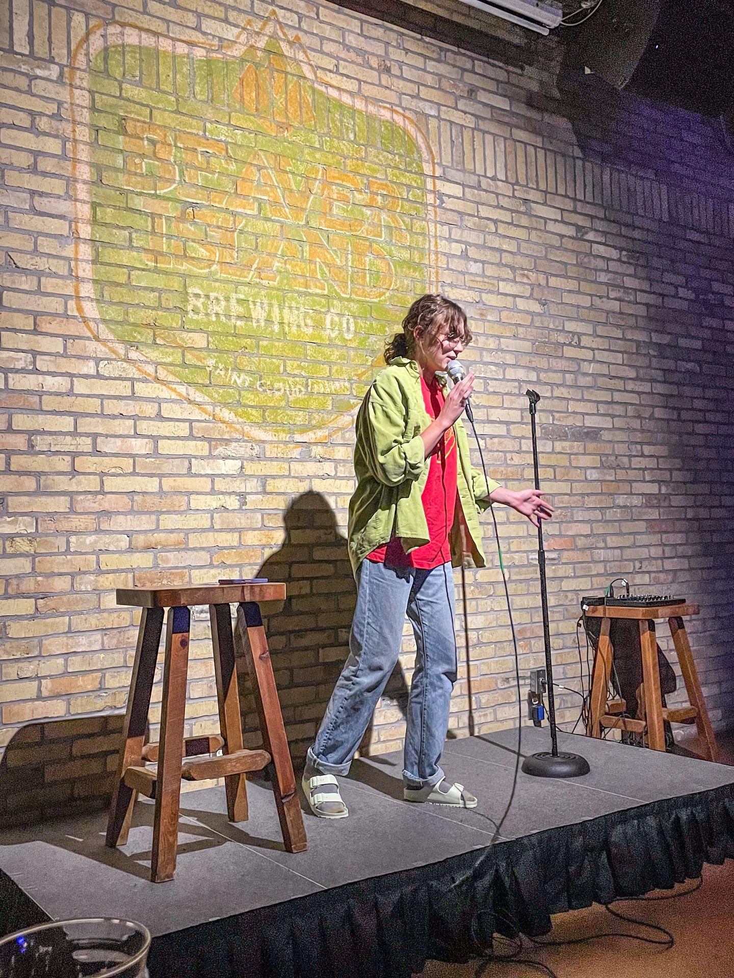 A comedian on stage at Beaver Island Brewing