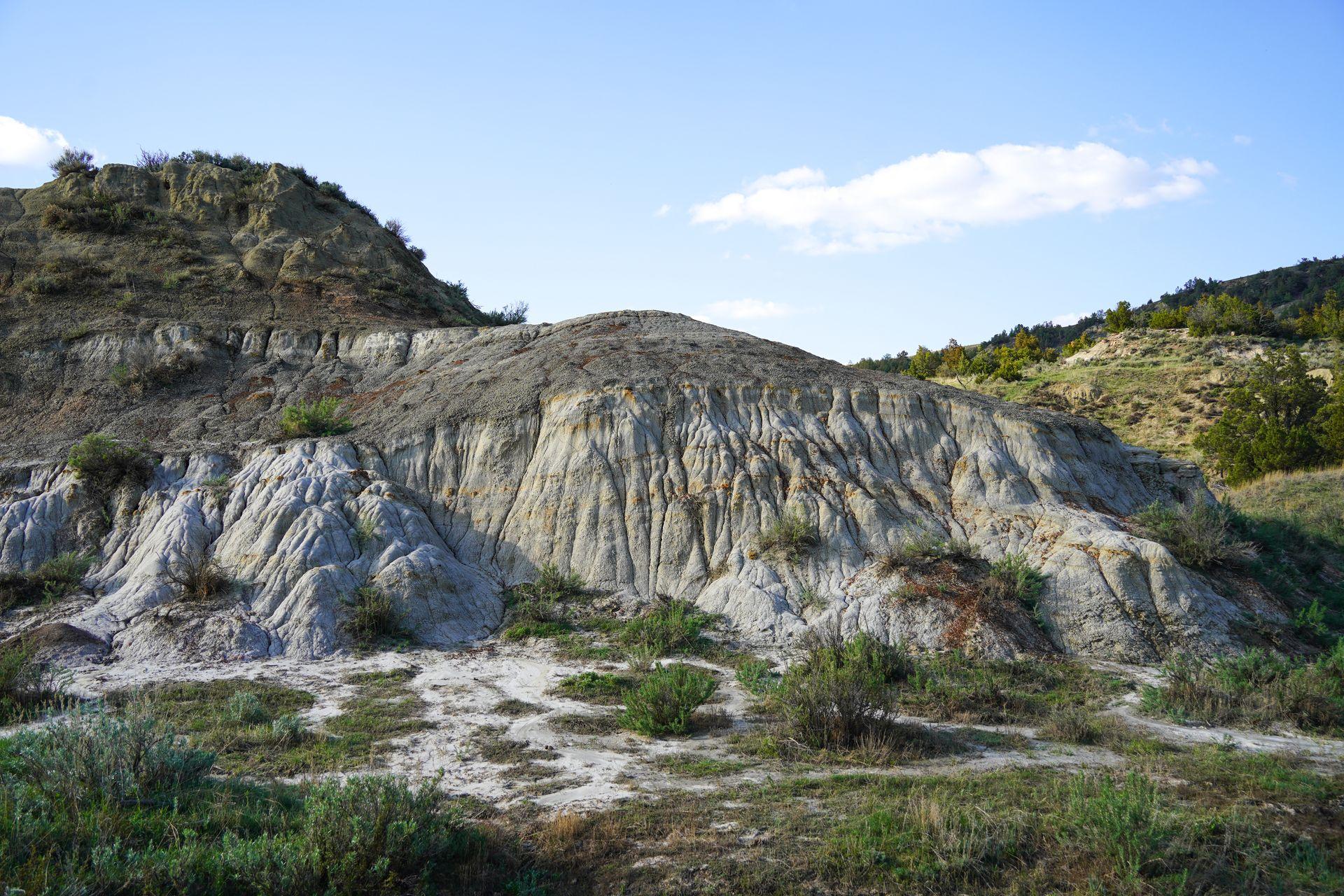 A white badland rock formation on the Coal Vein Trail