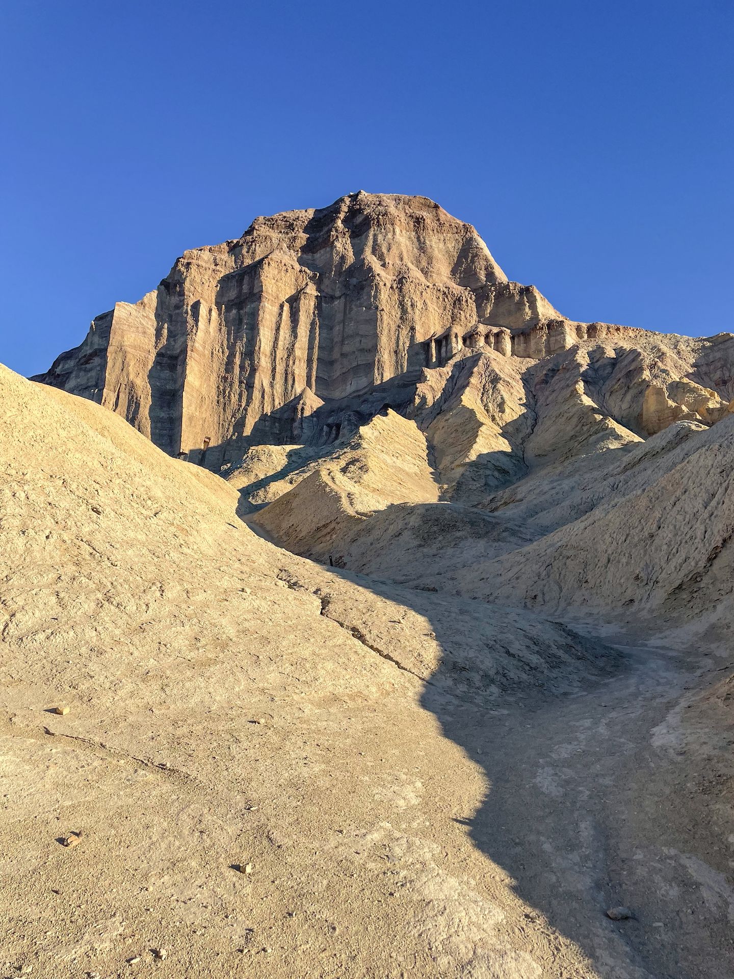Golden badlands and rock formations in the Golden Cathedral area of the park.