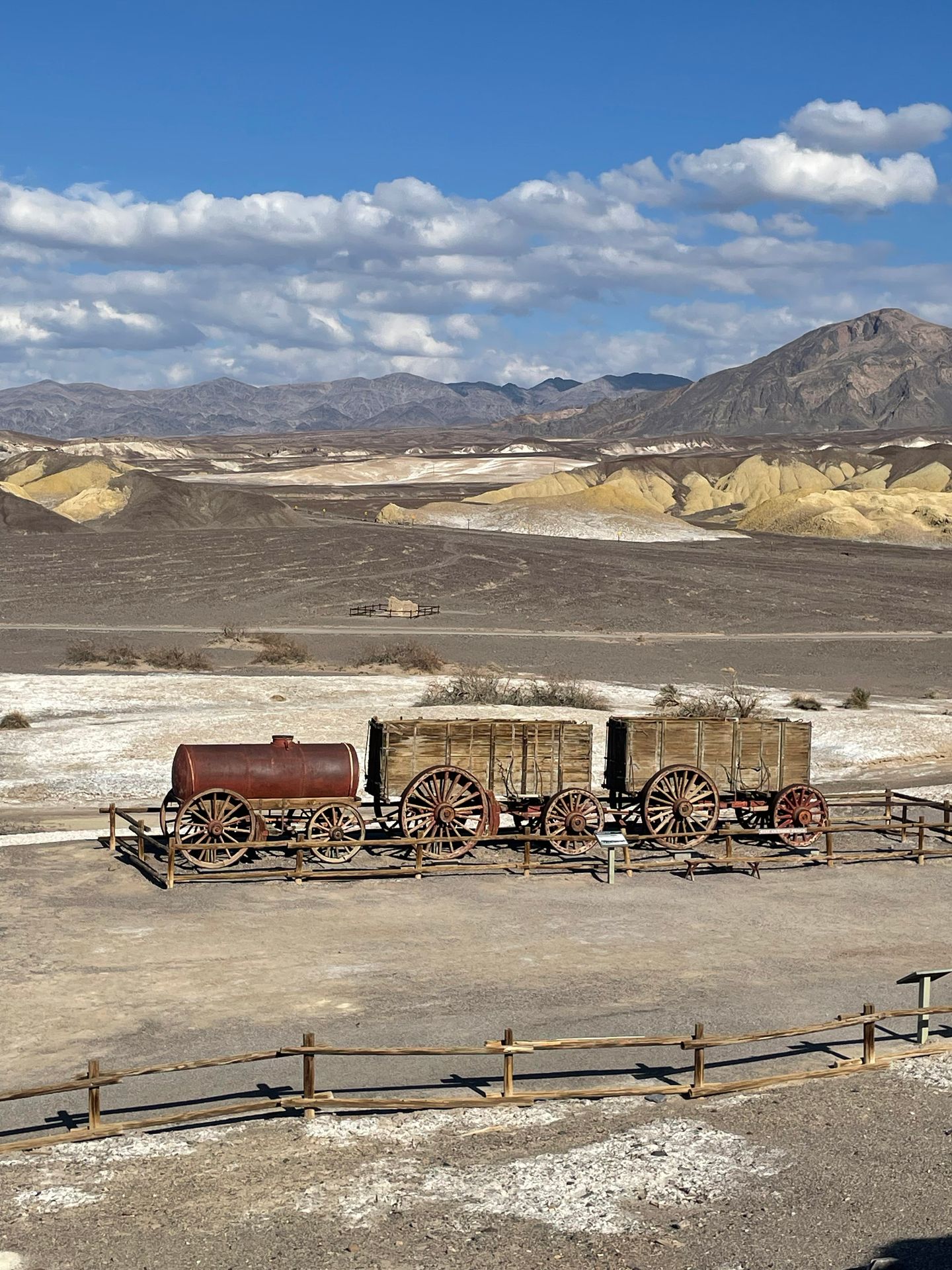 A tank and other items that were used to transport items related to Borax mining in Death Valley.