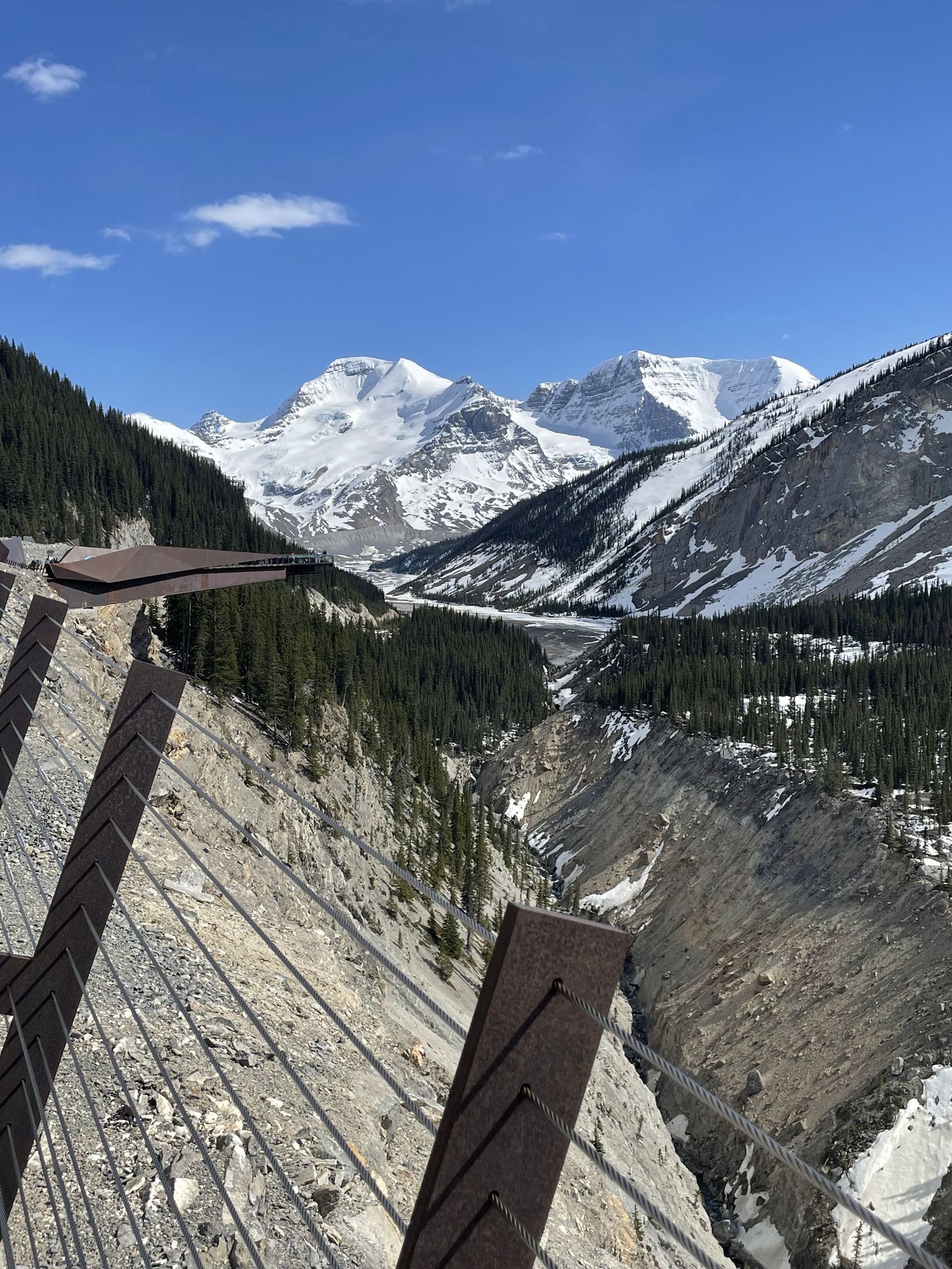 A canyon with a Skybridge that extends straight out into the canyon.