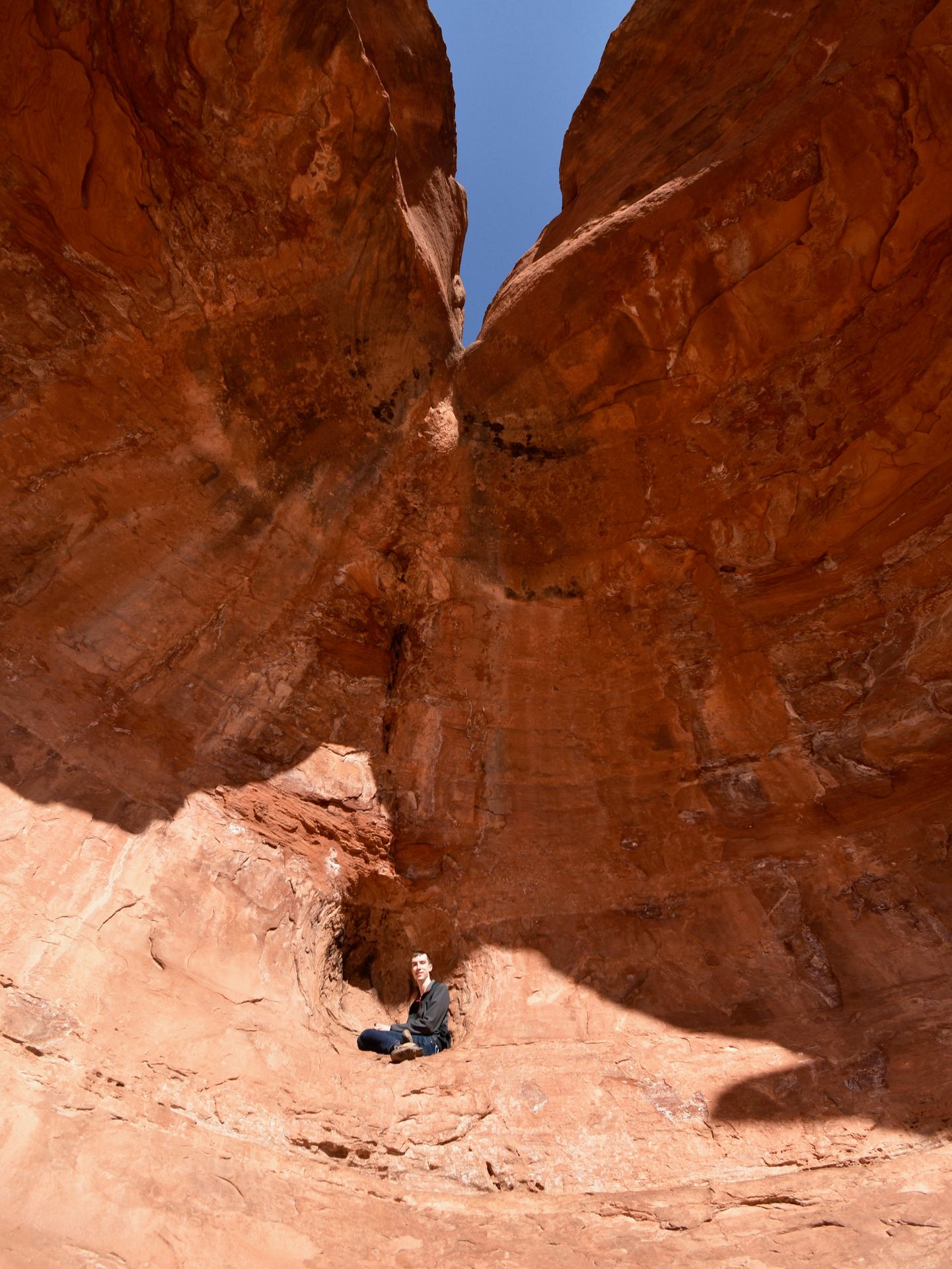 Joe sitting inside of the back of Birthing Cave.