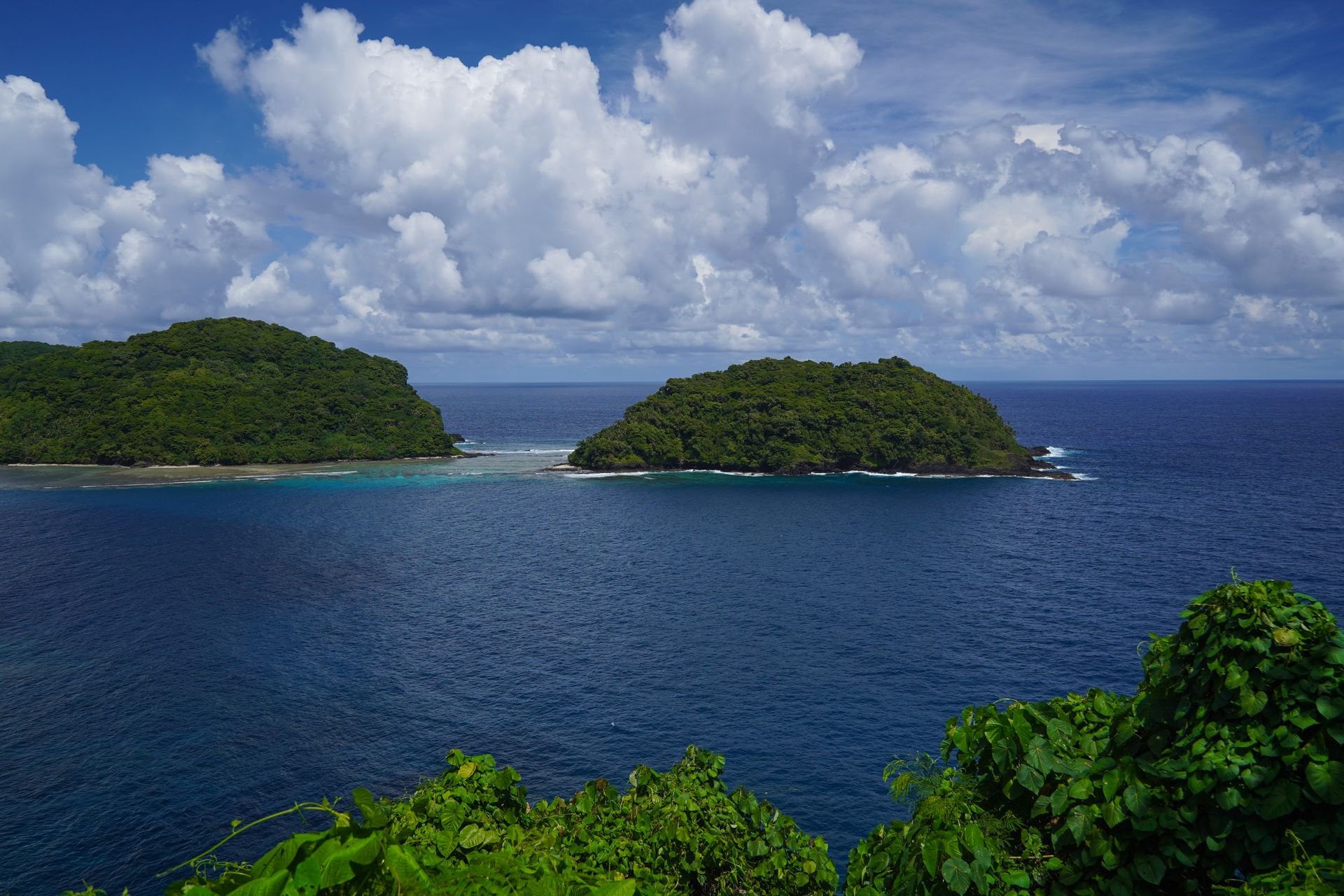 A view of an island next to a peninsula on the north side of American Samoa